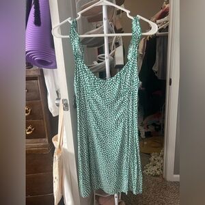 Never been worn Beginning boutique mini green floral dress. AUS SIZE 8 US SIZE 4